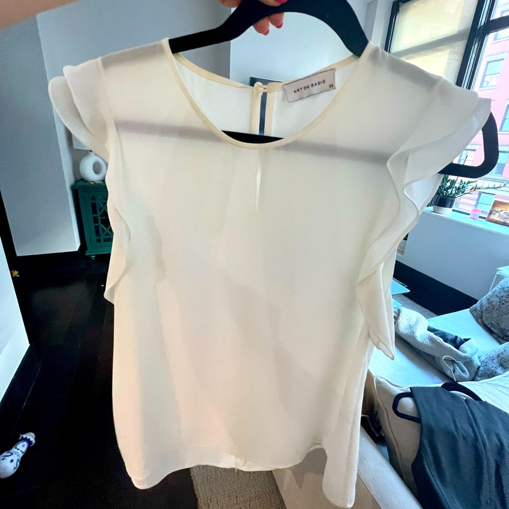 White blouse with ruffles from Paris